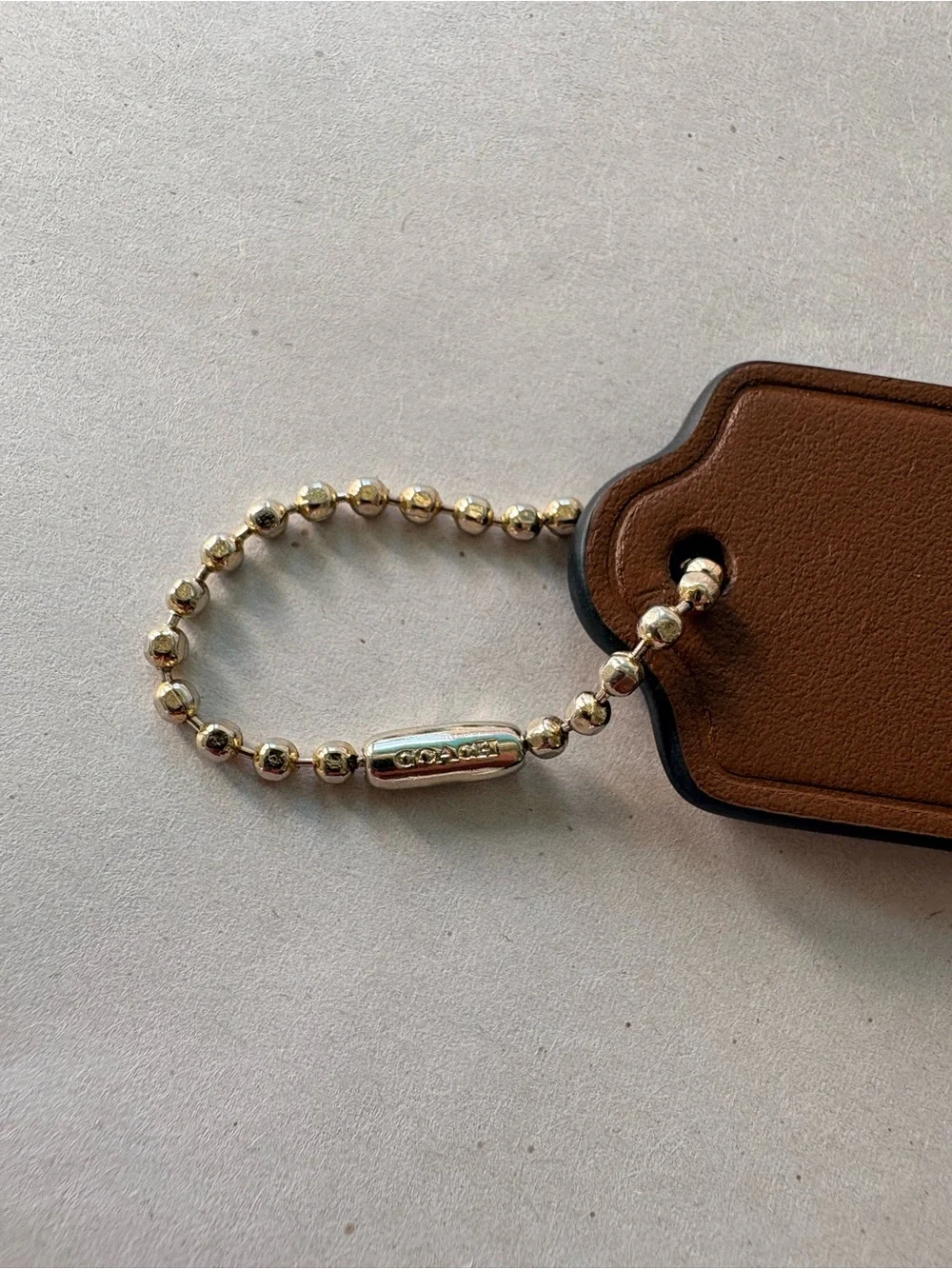 🦸♀️ Coach x MARVEL Ltd Ed Saddle Brown Leather HangTag Bag Charm | 2.375” - Picture 3 of 7
